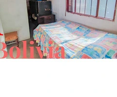 CASA EN VENTA EN EL Km 9 AL NORTE -- A 3 CUADRAS DE LA AVENIDA BANZER - 14